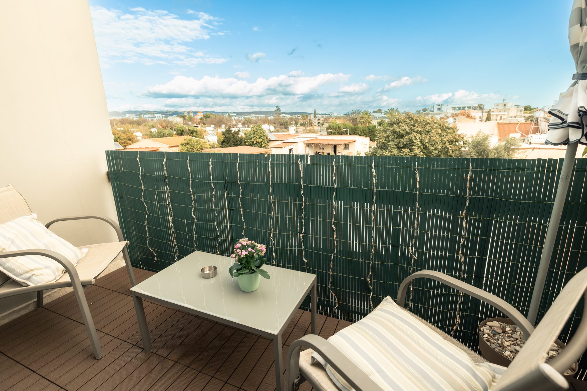 Balcony with city and mountain views